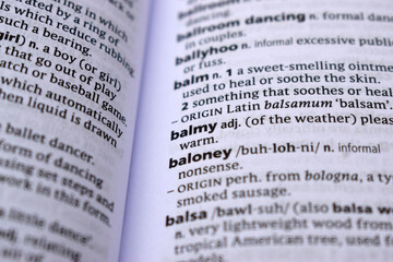 Close Up Of English Dictionary Page With Definition Word - Balmy