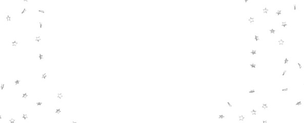 Holiday backdrop made of silver stars and sparkles on white wooden background. New Year concept.