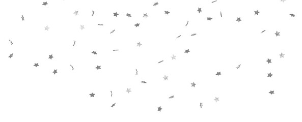 Holiday backdrop made of silver stars and sparkles on white wooden background. New Year concept.