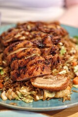 Grilled chicken breast with vegetables and fried rice