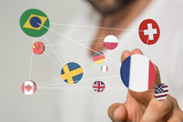 Image of a hand interacting with a network of countries, representing global business and...