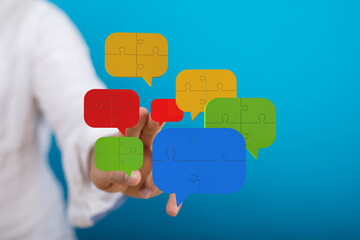 Colorful puzzle pieces represent teamwork, communication, and innovative solutions.