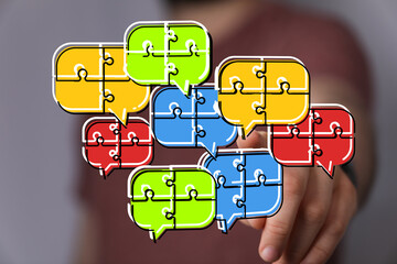 Colorful puzzle pieces in speech bubbles represent teamwork, communication, and problem-solving.