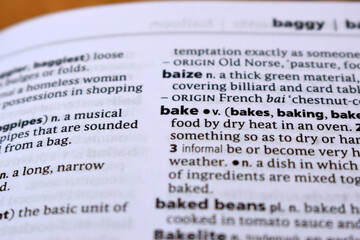 Close Up Of English Dictionary Page With Definition Word - Bake