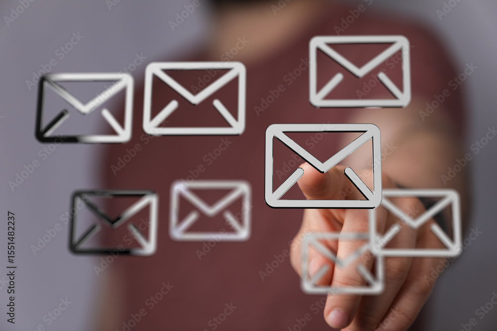 Poster Close-up of a person interacting with email icons on a touchscreen.