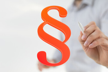 Red paragraph symbol on digital screen. Law, legal, article concept. Stock photo.