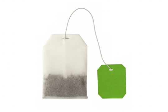 Unused tea bag with green label on transparent background