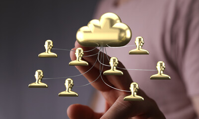 Image depicts a golden cloud connected to multiple golden user icons, symbolizing secure...