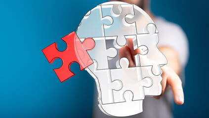 Conceptual image of a person solving a puzzle representing the human mind.  Perfect for psychology,...