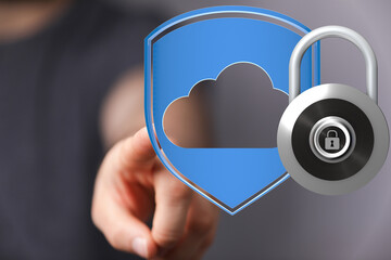 Image of a hand interacting with a digital shield and lock, representing secure cloud data.