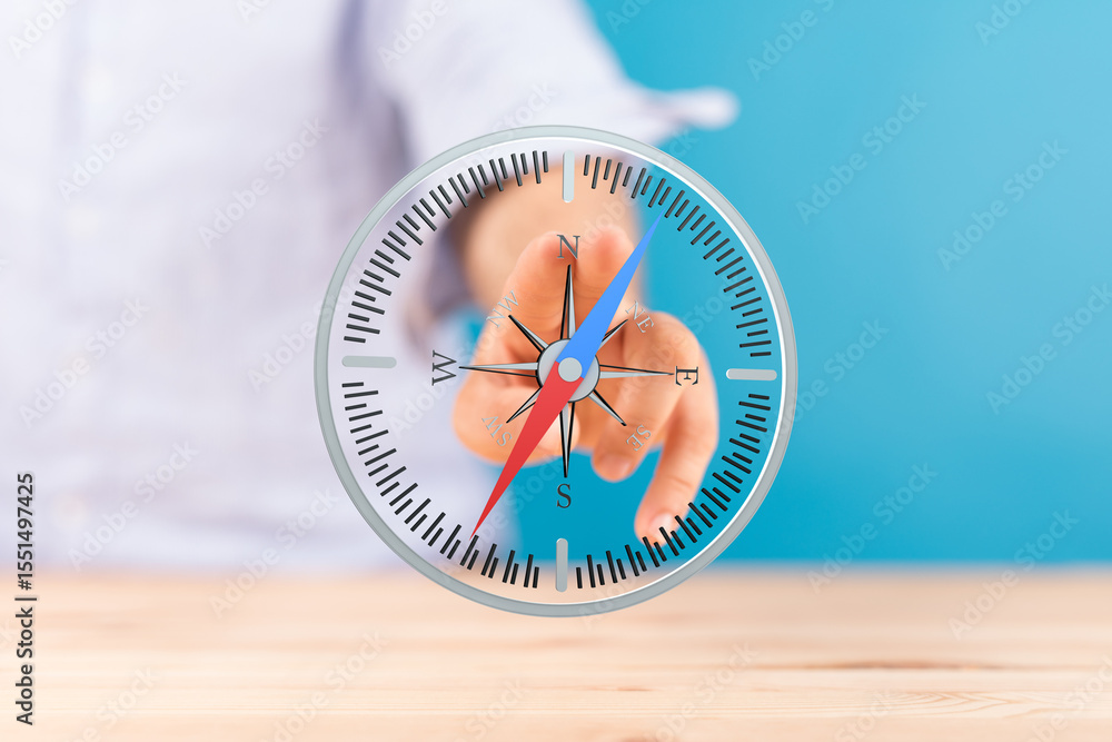 Poster seo-friendly image of a hand pointing at a compass, ideal for business, strategy, and direction conc