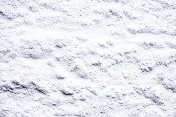 Textured, light gray powder or plaster surface