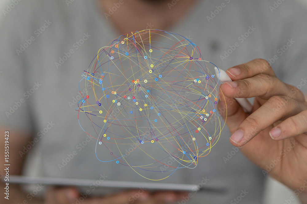 Poster Abstract image of a person using a stylus to interact with a colorful network visualization on a tablet.