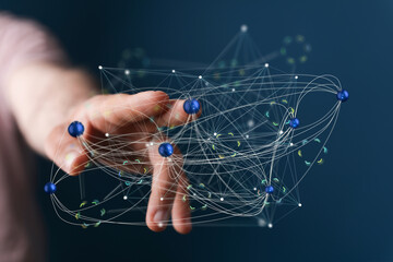 Abstract image of a hand interacting with a complex network.  Perfect for technology, connection,...