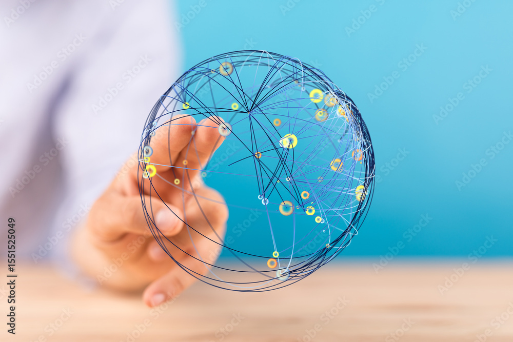 Aufkleber hand interacting with a digital globe, illustrating global network connections and data flow.