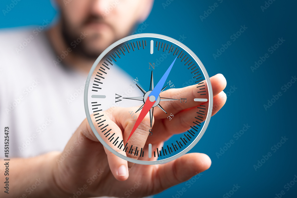 Poster image of a person interacting with a digital compass, symbolizing guidance and strategic planning.