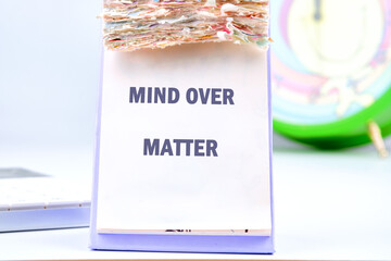The conceptual phrase MIND OVER MATTER. The concept of beauty and health. Business and Keep an open...