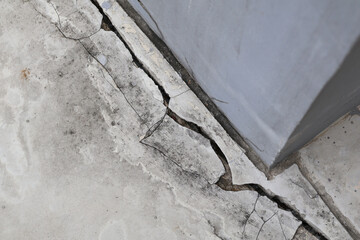 An earthquake significant crack to develop in the cement floor.