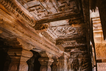 Intricately carved temple ceiling with traditional Indian motifs at Badami, Karnataka, India.