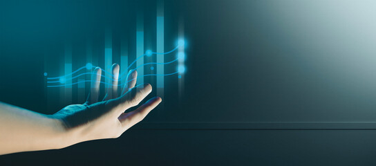 hand of businessman interactive touching a holographic of transaction financial network data...