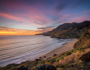 Scenic coastal landscape with mountains and beach at sunset, colorful pastel sky, tranquil ocean view, nature background