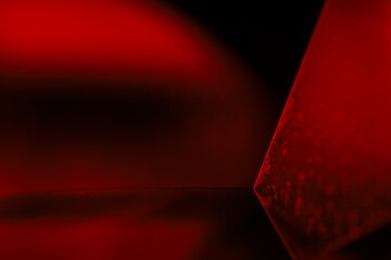 Red liquid surface, dark abstraction 