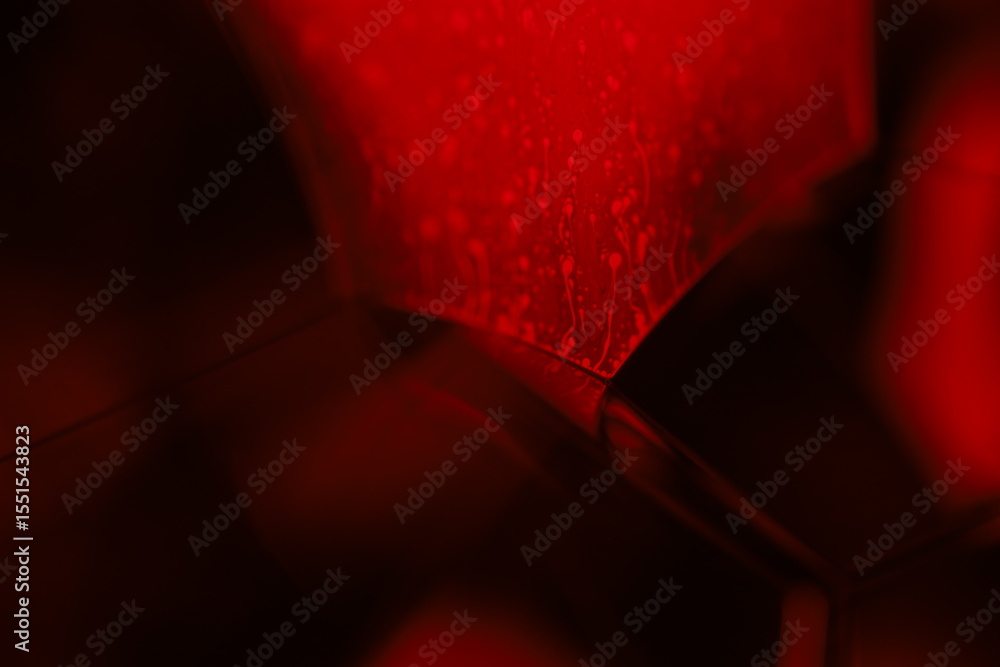 Fototapete red reflections of liquid in macro, red liquid surface, bubbles in macro, connection of bubbles in m