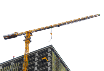 Isolated on transparent background photo of construction process of multi-storey monolithic building using orange-colored industrial construction crane of tower type to coupling of load is not hooked