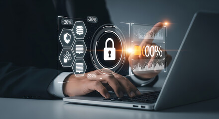 Businessman working on a laptop with data security and digital information protection