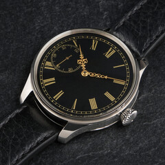 Detailed macro shot of a vintage-inspired wristwatch with a black face, gold Roman numerals, and an ornate second subdial. Ideal for luxury watch ads, editorial, or product listings.