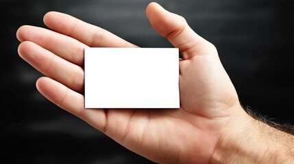 Obraz premium Blank Card in Hand: Clean Professional Presentation with Room for Custom Messaging