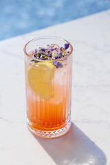 Refreshing summer lemonade with orange and lemon slices