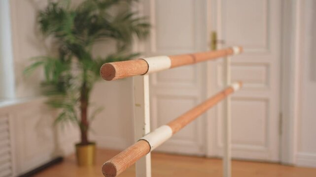 Empty ballet dance studio with barre. Professional ballet barre for stretching practicing dancing positions in dance school Dance hall ready for ballet class training. Ballet school