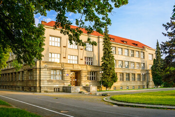 uzhhorod, ukraine - 03 jun 2012: medical faculty building of national university. scenic urban landscape located near embankment of independence (linden alley) in morning light