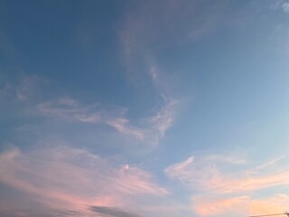 Beautiful pastel sky with soft clouds at sunset