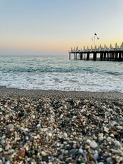 Turkish coast with Mediterranean sea and pebbles