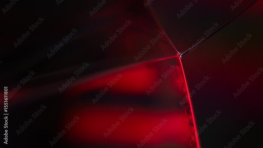 Poster red reflections of liquid in macro, red liquid surface, bubbles in macro, connection of bubbles in m