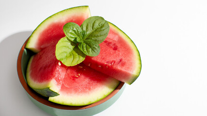 Juicy watermelon slices with mint evoke midsummer dreams, tantalizing Thirsty Thursday, and sizzling solstice celebrations on sunlit patios