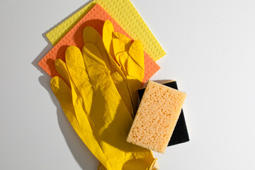 Yellow gloves, textured sponges, vibrant cleaning harmony, spring refresh ritual, Hygge-inspired...