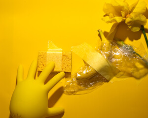 Yellow surreal tableau, rubber glove mimics petal dance, eco-cleaning meets Dadaist dream, bright...
