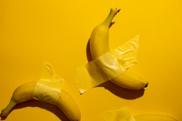 Entangled bananas with avant-garde tape, reminiscent of absurdist art, a quirky nod to Unofficial...