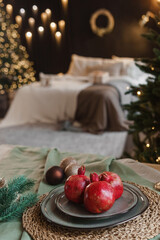 Serving a festive Christmas table in Scandinavian style. Decor on the table before the holiday.