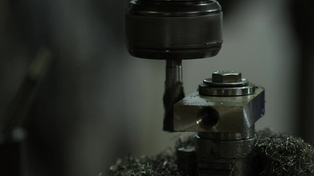 VDO 4K Lathe is working on turning metal parts for industrial use.	
