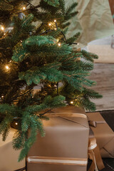 Bronze balls on the Christmas tree close-up. Christmas tree design decorations. The concept of celebrating New Year and Christmas.
