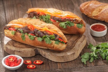Vietnamese Banh mi is a flatbread or sandwich containing vegetables and sliced ​​meat.