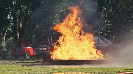 Fire explosion flammable car fire on street smoke, hot danger flame burning effect. Fire burn car...