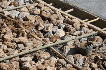 The rock barrier is made of steel wire wrapped around a net to create a rock barrier to prevent the...