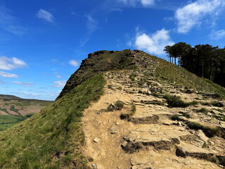 Scenic view of the ascent to Back Tor in the Peak District, with a dry rocky path leading up the...