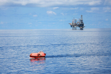 Life boat in gulf or sea to support oil and gas platform, Safety equipment to protect worker when fire case in oil and gas industry, Evacuation equipment in and and gas platform, Safety equipment.