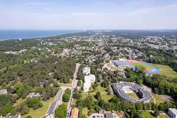 A vibrant aerial view of Palanga, Lithuania, showcasing the Baltic seaside town’s unique...